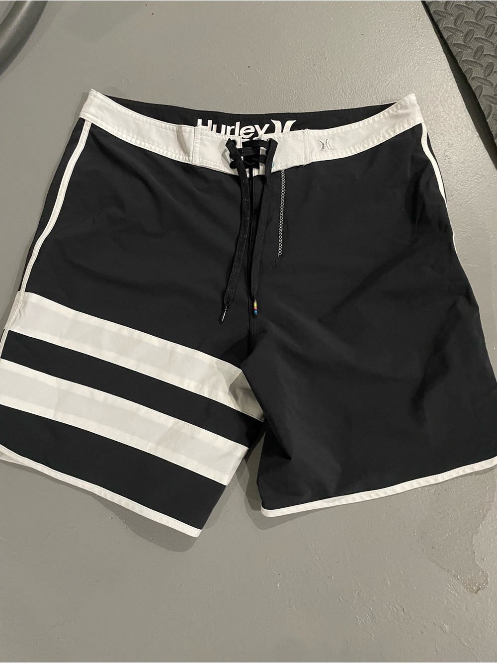 3 pair size 34. Hurley Black and White and grey striped Men's Swim Trunks